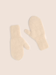 Wool mittens in milk