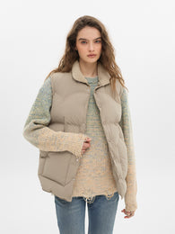 Winter-ready vest with faux fur collar in beige