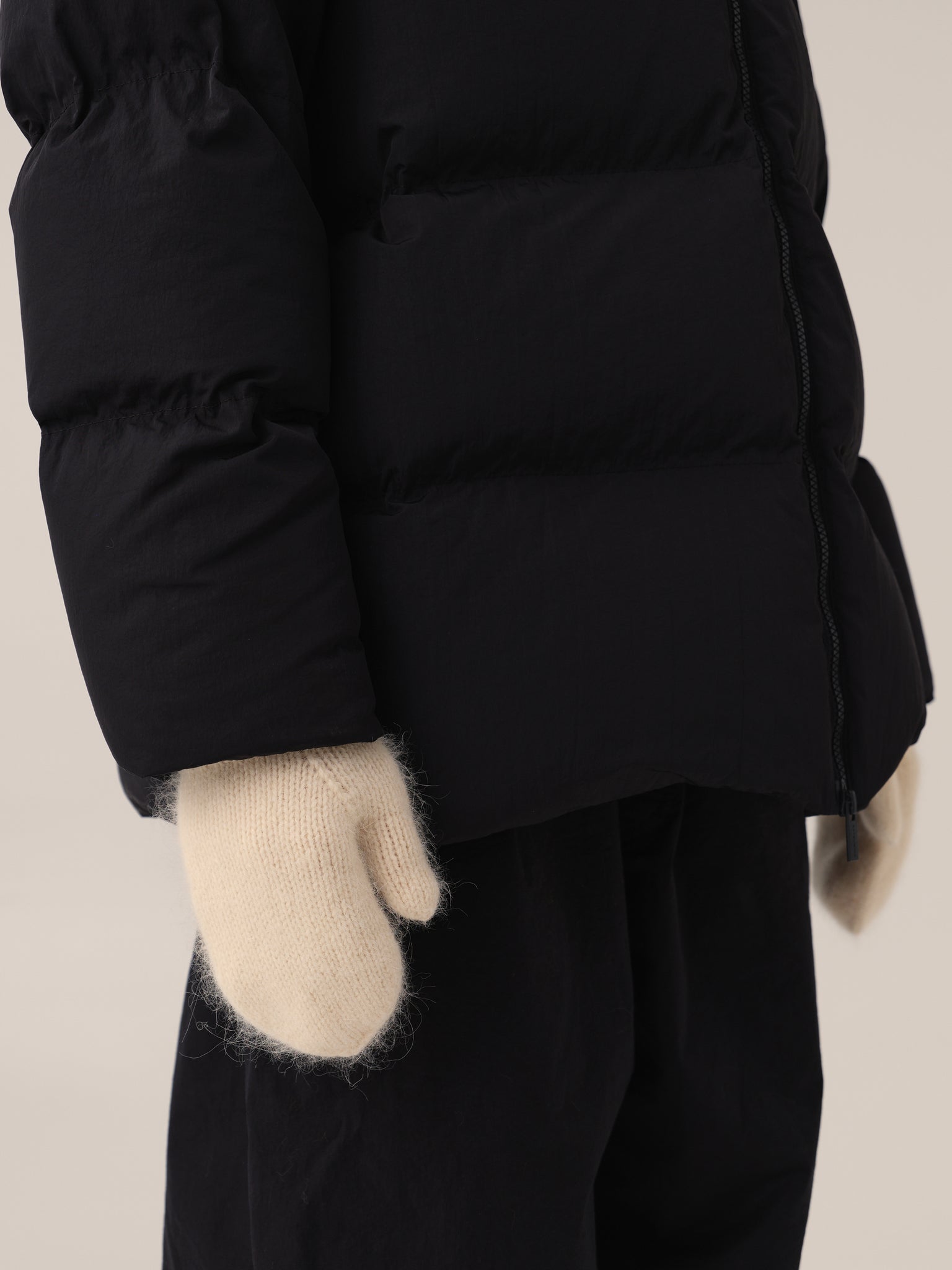 Wool mittens in milk