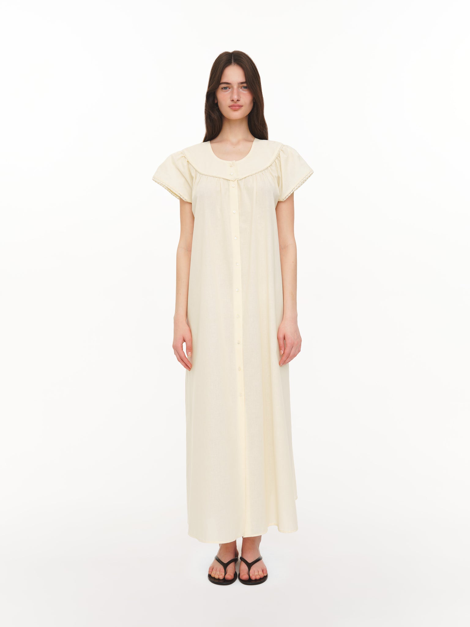 Buttoned dress in ivory