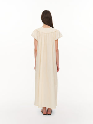 Buttoned dress in ivory