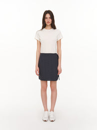 Black wrap mini skirt with a side tie
