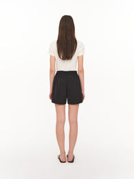 Black satin shorts